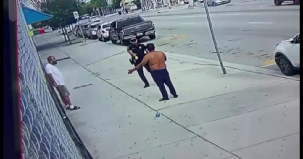 A Miami detective stopped a homeless man's attack